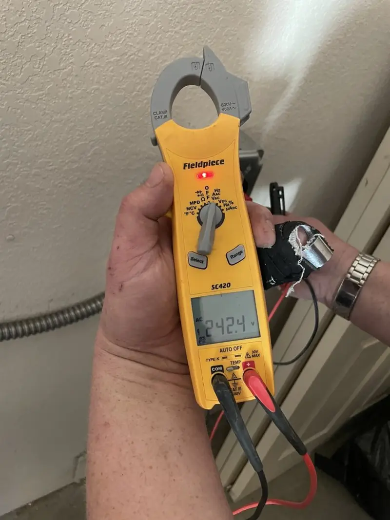 Voltage testing with clamp meter during Generator Installation in Union Vale